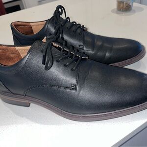 Men’s brand new black dress shoes. Size 10